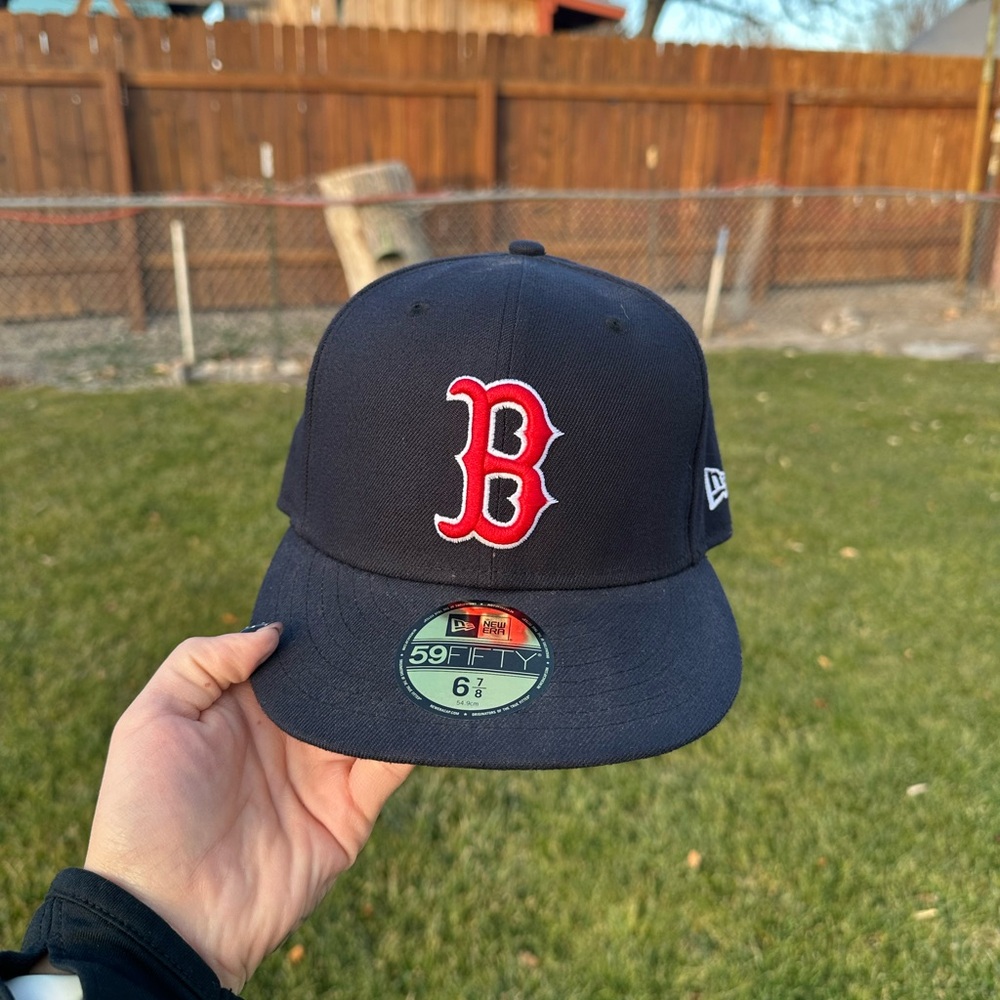New Era Dark Blue Cap with Red Emblem